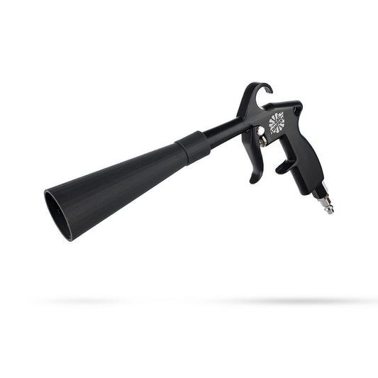 The Ultra Air Blaster is a durable and convenient tool made of robust metal components, specifically designed to lift and blast away dirt, sand, and debris from a car's interior carpets, upholstery, and plastics. It can also be used for blowing out buffing pads. The tool is trigger-operated and comes with two interchangeable trumpet options - a standard trumpet for smooth and even dispersal of air pressure, and a bristle cone trumpet for tackling stubborn particles and debris. By The Rag Company. 